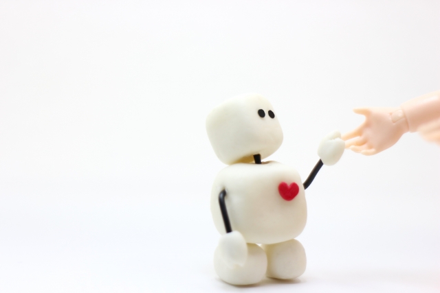 人と手をつなぐロボット